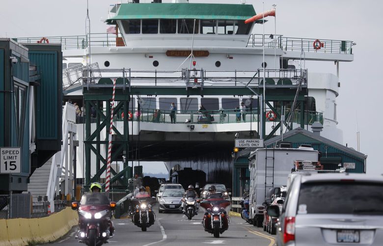 The M/V Puyallup unloads in Edmonds, Tuesday, Aug. 31, 2021. Washington State Ferries cruise toward a rocky Labor Day weekend, as chronic crew shortages are worsened by COVID-19.  218089