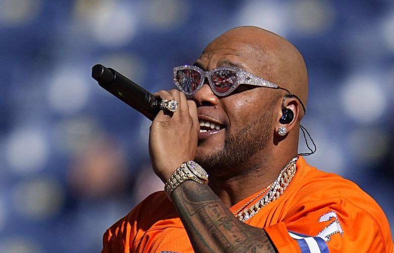 FILE – Singer Flo Rida performs at halftime during of an NFL football game between the New York Jets and the Denver Broncos, Sunday, Sept. 26, 2021, in Denver. Hip hop artist Flo Rida, whose real name is Tramar Dillard, was awarded $82.6 million on Wednesday, Jan. 18, 2022, after a South Florida jury found that the makers of Celsius energy drinks breached a contract with the rapper and singer and tried to hide money from him. (AP Photo/Jack Dempsey, File) NYPH601 NYPH601