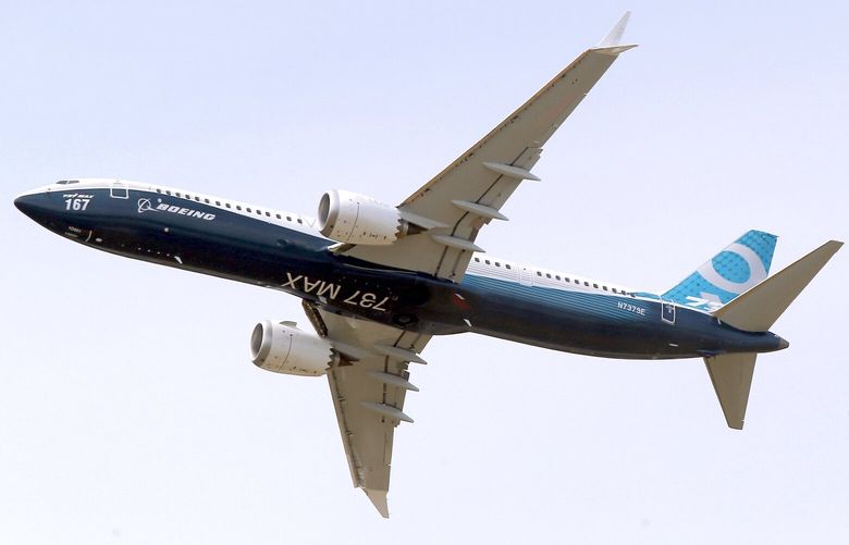 FILE – A Boeing 737 MAX 9 airplane performs a demonstration flight at the Paris Air Show in Le Bourget, east of Paris, France, June 20, 2017. A federal judge has ordered Boeing Co. to be arraigned on a felony charge stemming from crashes of two 737 Max jets, a ruling that threatens to unravel an agreement Boeing negotiated to avoid prosecution. (AP Photo/Michel Euler, File) NYSS517 NYSS517