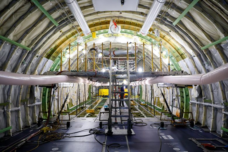 A view from the tail looking forward through the lower cargo deck of the final 747. (Jennifer Buchanan / The Seattle Times)