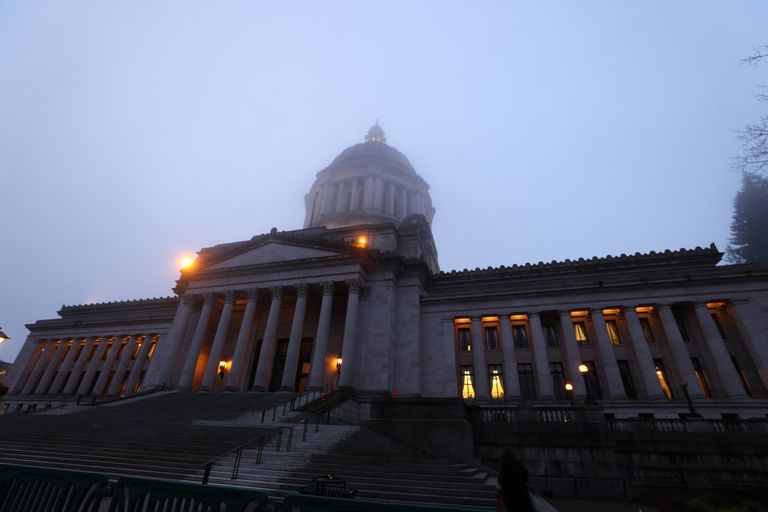 The Legislative Building in Olympia is caught in predawn fog on Jan. 10.