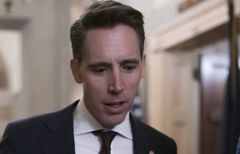 FILE – Sen. Josh Hawley, R-Mo., after Senate Republicans met behind closed-doors to hold their leadership elections, at the Capitol in Washington, Wednesday, Nov. 16, 2022.  Two years after  Hawley’s now-famous raised-fist salute to rioters at the Capitol, Lucas Kunce, a Marine veteran who ran unsuccessfully for Senate in 2022 announced Friday, Jan. 6, 2023 that he’ll try to unseat Hawley in 2024.  (AP Photo/J. Scott Applewhite, File) NY108 NY108