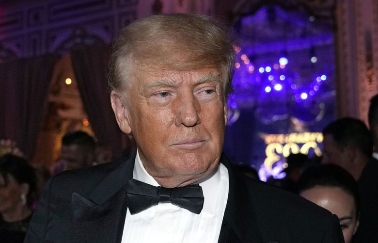 FILE — Former President Donald Trump arrives for a New Years Eve party at Mar-a-Lago, in Palm Beach, Fla., Dec. 31, 2022. Trump has abandoned efforts to revive his federal lawsuit against New York Attorney General Letitia James — the second time he’s halted legal action against her after a judge last week fined him and his lawyers nearly $1 million for filing frivolous cases. (AP Photo/Lynne Sladky, File) NYRD204 NYRD204