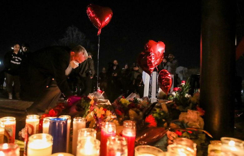 Mourners take part in a vigil for the victims of a mass shooting at the Star Ballroom Dance Studio on Monday, Jan. 23, 2023, in Monterey Park, California. The investigation is focused on the gunman’s prior interactions at two dance studios he targeted and whether jealousy over a relationship was the motive, law enforcement sources said. (Allen J. Schaben/Los Angeles Times/TNS)