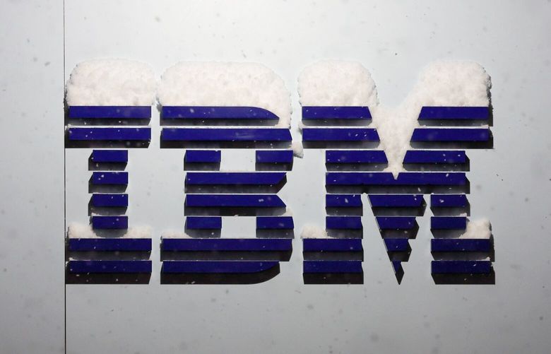 Snow on the top of the International Business Machine IBM Corp. logo at their pavilion ahead of the World Economic Forum (WEF) in Davos, Switzerland, on Sunday, Jan. 15, 2023. On Wednesday, IBM said is it cutting about 3,500 jobs but still expects to hire in the “higher-growth areas.” (Stefan Wermuth/Bloomberg)