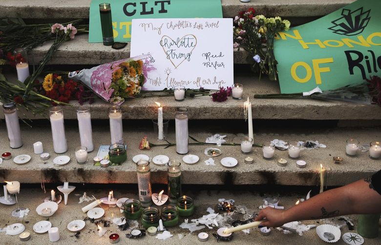 FILE – A memorial on the University of North Carolina at Charlotte campus, the day after a gunman opened fire on students, May 1, 2019. Riley Howell, a student, was shot and killed while helping to stop the gunman. (Travis Dove/The New York Times)