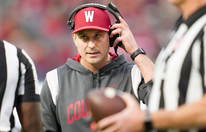 Washington State head coach Jake Dickert talks to officials during the first half of the LA Bowl against Fresno State in Inglewood, Calif., Saturday, Dec. 17, 2022. (AP Photo/Ashley Landis) otk103