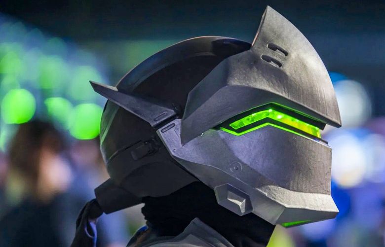 An attendee dressed as the character Genji from Overwatch during the Activision Blizzard Inc. Overwatch League ‘Battle For Texas’ tournament at Tech Port Arena in San Antonio, Texas, U.S., on Friday, May 6, 2022. The ‘Battle For Texas’ tournament is the first in-person match since early 2020.