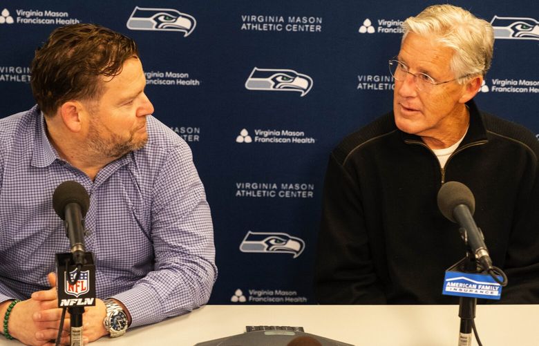John Schneider and Pete Carroll talk about  Charles Cross, an offensive lineman out of Mississippi State, who was taken by the Seahawks in the first round of the NFL Draft  Thursday, April 28, 2022. 220256