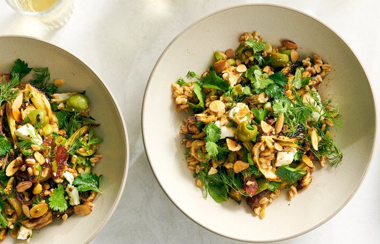 A fennel-farro salad, which gains savoriness from briny olives and sweetness from thinly sliced dates, in New York, Jan. 11, 2023. This is the sweet spot for seasonal vegetables as time in the ground increases their sugar. Food Stylist: Simon Andrews. (David Malosh/The New York Times) XNYT45
