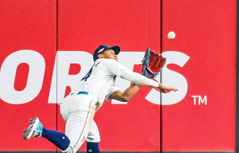 Julio Rodriguez makes the catch to save a hit from Yuli Gurriel in the 16th inning as the Seattle Mariners take on the Houston Astros for Game 3 of the American League Division Series Saturday October 15 2022 in Seattle. 221880 221880