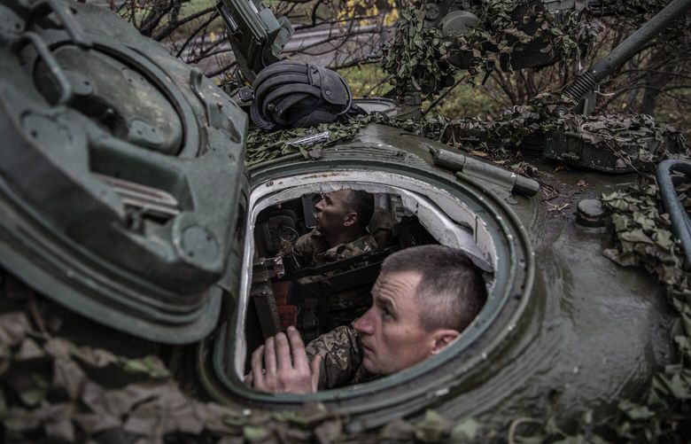 FILE — A Ukrainian tank crew in their vehicle near Borova in the Kharkiv region of Ukraine, Nov. 4, 2022. Thanks supplied by the U.S. will have symbolic significance, sending important signals to both Ukraine and Russia about continued American support. (Finbarr O’Reilly/The New York Times)  XNYT143 XNYT143
