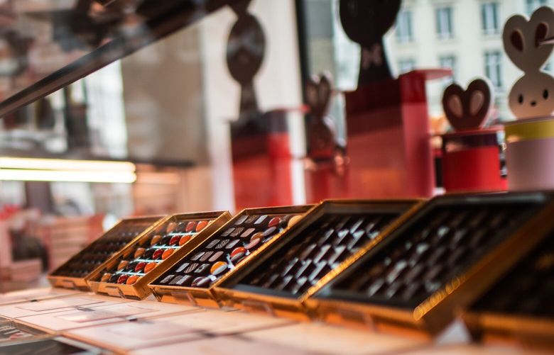 A variety of chocolates on display inside Pierre Marcolini, a luxury chocolate shop in Brussels, in 2019. MUST CREDIT: Washington Post photo by Salwan Georges