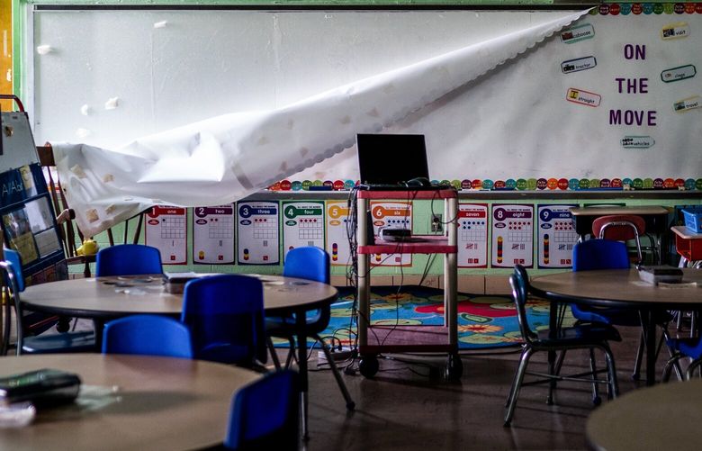 FILE — An empty classroom in Baltimore, Md., on April 14, 2020. Learning delays and regressions were most severe in developing countries and among children from low-income backgrounds. — And students still haven’t caught up. (Erin Schaff/The New York Times) XNYT20 XNYT20