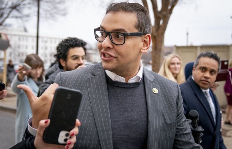 Rep. George Santos, R-N.Y., leaves a House GOP conference meeting on Capitol Hill in Washington, Wednesday, Jan. 25, 2023. (AP Photo/Andrew Harnik) DCAH119 DCAH119
