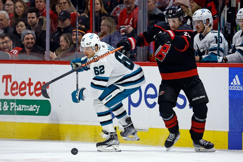 Martin Necas leads Hurricanes past Sharks 5-4 in overtime