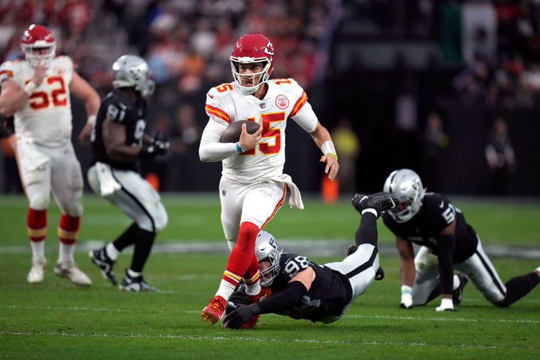 Kansas City Chiefs quarterback Patrick Mahomes runs the ball