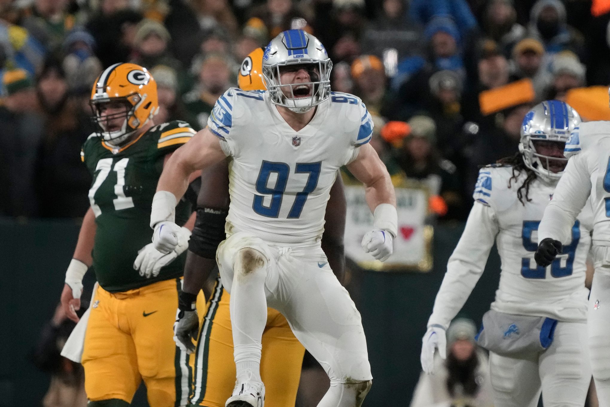 Detroit Lions head coach Dan Campbell reacts to Lions fans energy during  first preseason game