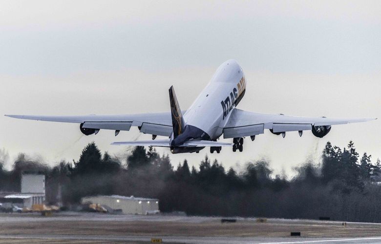 The last ever manufactured Boeing 747, the “Queen of the Skies,” says goodbye as it leaves on a flight to Cincinnati from Paine Field in Everett on Feb. 1, 2023.