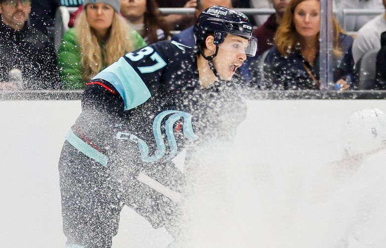 Seattle Kraken center Yanni Gourde puts on the brakes, putting up a cloud of ice during the first period. 222787