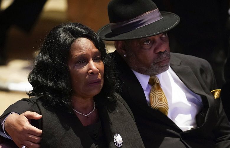 RowVaughn Wells cries as she and her husband Rodney Wells attend the funeral service for her son Tyre Nichols at Mississippi Boulevard Christian Church in Memphis, Tenn., on Wednesday, Feb. 1, 2023. Nichols died following a brutal beating by Memphis police after a traffic stop.  (Andrew Nelles/The Tennessean via AP, Pool) TNNAT450 TNNAT450