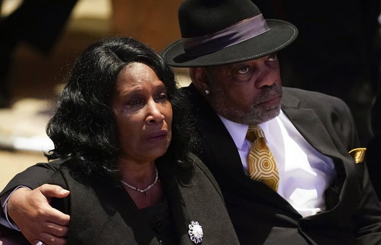 RowVaughn Wells cries as she and her husband Rodney Wells attend the funeral service for her son Tyre Nichols at Mississippi Boulevard Christian Church in Memphis, Tenn., on Wednesday, Feb. 1, 2023. Nichols died following a brutal beating by Memphis police after a traffic stop. (Andrew Nelles/The Tennessean via AP, Pool) TNNAT450 TNNAT450