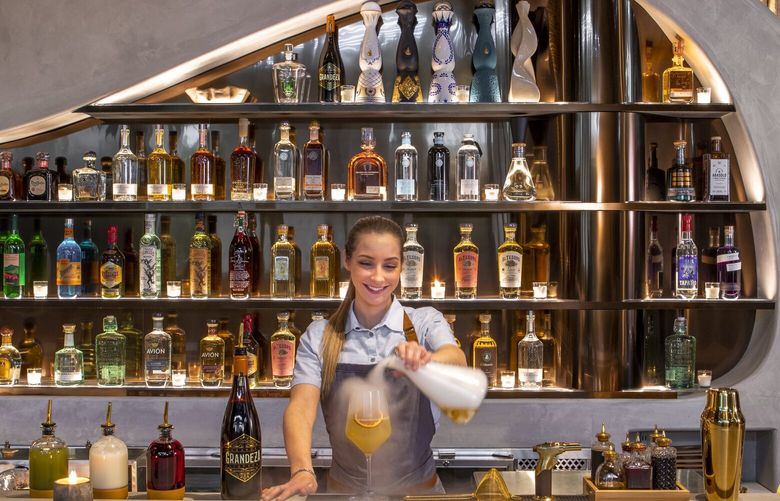 Cantina Monarca boasts a 100-tequila-list and handful of playful takes on the margarita. Picture is its Cadillac Fog tequila cocktail with an orange liquor float.