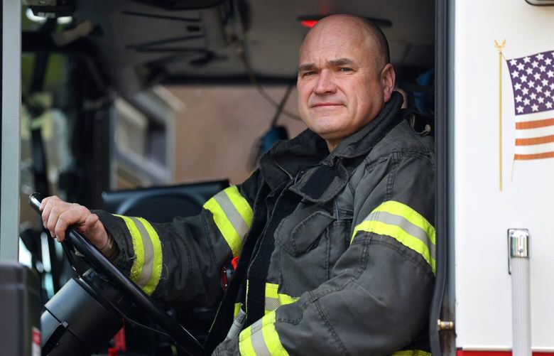 Firefighter Philip Knowles at King County Fire Station 77, Lake Youngs Station, in Kent on Thursday, February 2, 2023. Knowles responded to multiple deaths and critically ill patients during the 2021 heat dome. Now he’s the reason a bill is moving through the legislature seeking to add air conditioning to adult family homes (residential assisted living facilities).