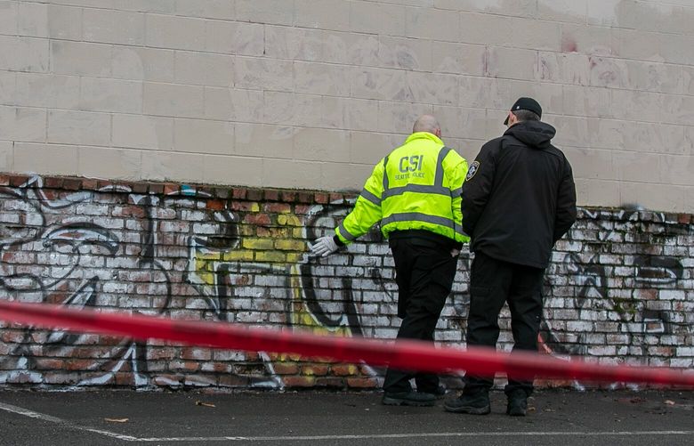 Members of the the Seattle Crime Scene Unit investigate a fatality on the 12000 block of Aurora Ave N in Seattle, Washington on Seattle, Washington on February 4, 2023.