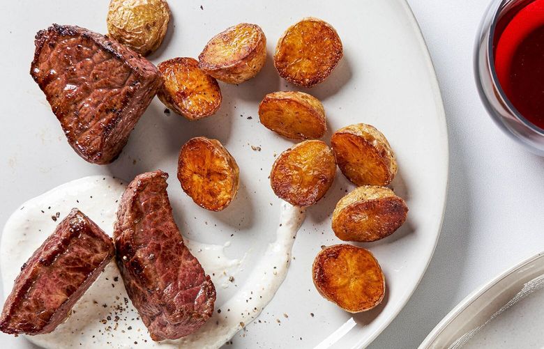 Seared Steak Tips With Potatoes and Horseradish Cream. MUST CREDIT: Photo by Rey Lopez for The Washington Post.