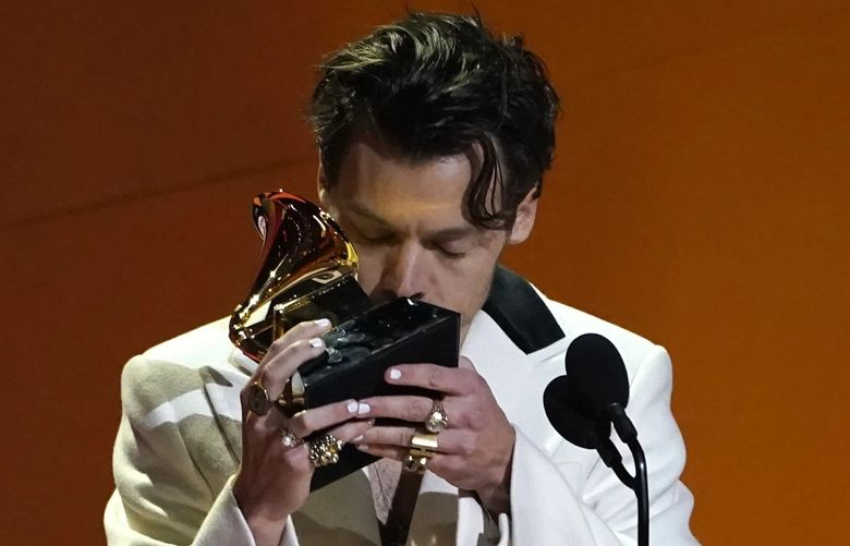 Harry Styles won album of the year for “Harry’s House” at the 65th annual Grammy Awards on Sunday in Los Angeles. Shown here, he also won the award for best pop vocal album. (Chris Pizzello / / Invision / AP)