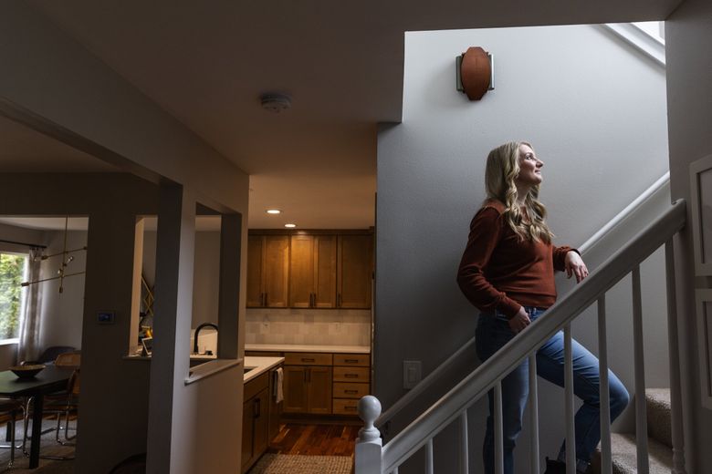 Ally Jackson and her husband are planning to list their Mill Creek house for sale and try to buy a new one in the Bothell area, something she wasn’t planning on being able to do in the past few years. (Ken Lambert / The Seattle Times)