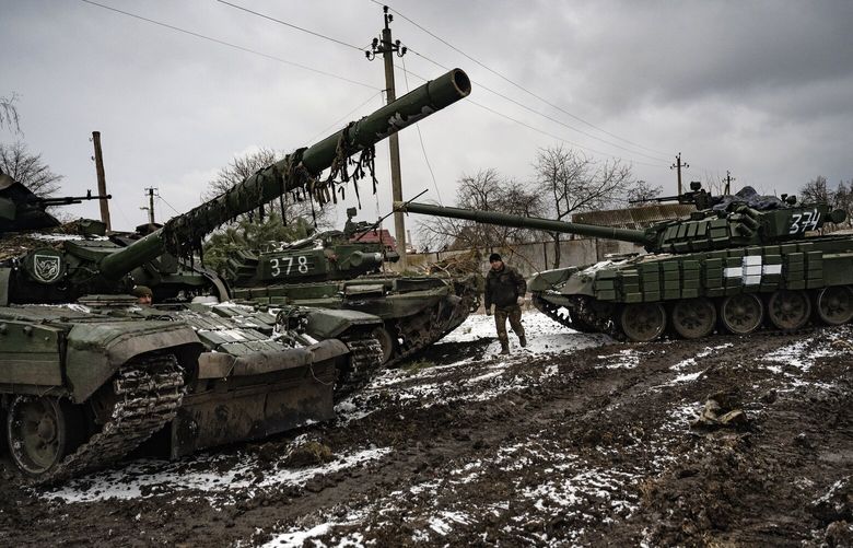 Tanks in a village near the front in eastern Ukraine on Sunday, Feb. 5, 2023. As Russia makes slow, bloody gains in a renewed push to capture more of eastern Ukraine, it is pouring ever more conscripts and military supplies into the battle, Ukrainian officials say, although it remains far from clear that Moscow could mobilize enough forces to sustain a prolonged offensive.  – NO SALES – XNYT65 XNYT65