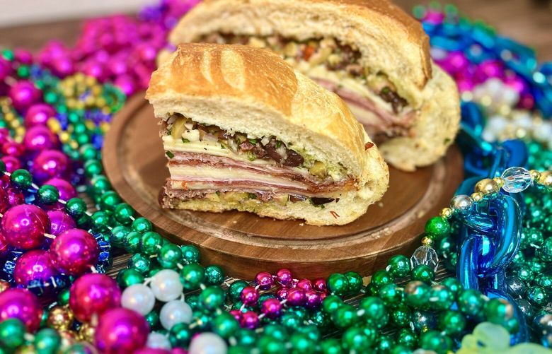 Olive relish gives the muffaletta sandwich a nice briny flavor that helps break up the fatty meats and cheeses.