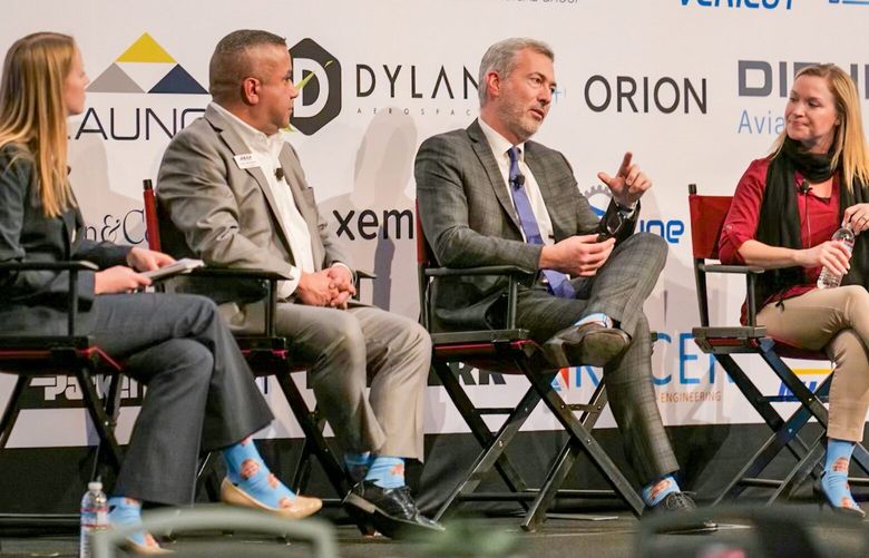 At the Pacific Northwest Aerospace Alliance suppliers conference in Lynnwood Wednesday, left to right, moderator Martha Neubauer of consultancy Aerodynamic Advisory discussed the industry’s labor shortage with Paul Michaels, a corporate director with Boyd GMN of Seattle; Daniele Cagnatel, CEO of Sekisui Aerospace of Kent and Sumner; and Allison Budvarson, COO of Out of the Box Manufacturing in Renton. Cagnatel called for a transformation of the local, traditionally low-wage, aerospace supplier industry to a high tech sector that would pay much higher wages.