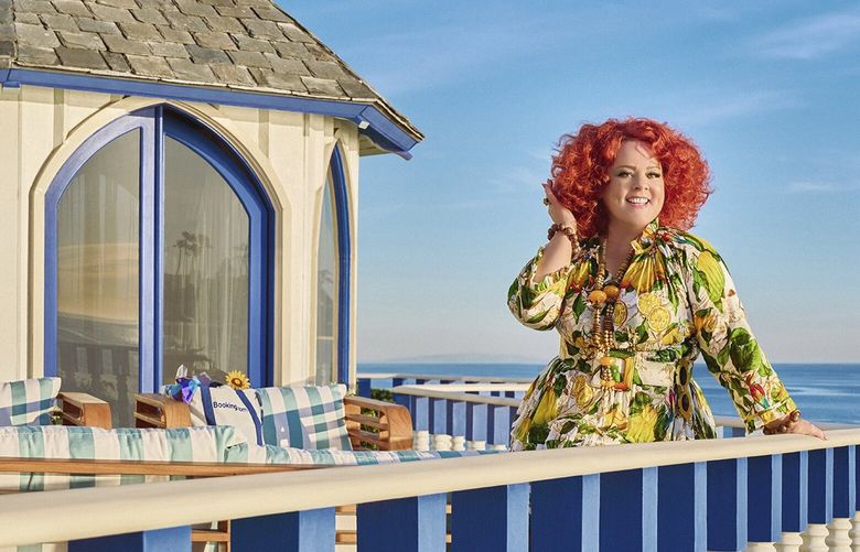 This photo provided by Booking.com shows Melissa McCarthy in scene from Booking.com 2023 Super Bowl NFL football spot. Big name advertisers are paying as much as $7 million for a 30-second spot during the big game on Sunday, Feb. 12, 2023. In order to get as much as a return on investment for those million, most advertisers release their ads in the days ahead of the big game to get the most publicity for their spots.  (Booking.com via AP) NYBZ227 NYBZ227