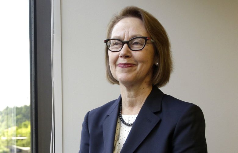 FILE – Oregon Attorney General Ellen Rosenblum poses for a photo at her office in Portland, Ore., on July 13, 2016. Rosenblum announced Friday, Feb. 10, 2023, that the Criminal Division of her agency, the Oregon Department of Justice, is opening a criminal investigation into the matter involving ethics violations related to the purchase of liquor by some staff of the Oregon Liquor and Cannabis Commission and possibly others. (AP Photo/Don Ryan, File) FX506 FX506