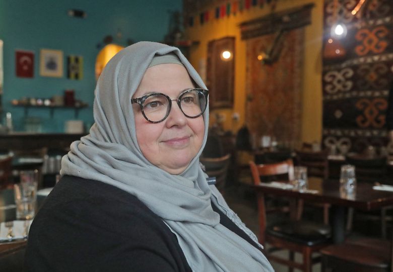 Sureyya Gokeri, co-owner and chef of Cafe Turko, raises money to help response to deadly earthquake in Turkey, Syria. &#8220;All we can do is pray,&#8221; she said. (Greg Gilbert / The Seattle Times)