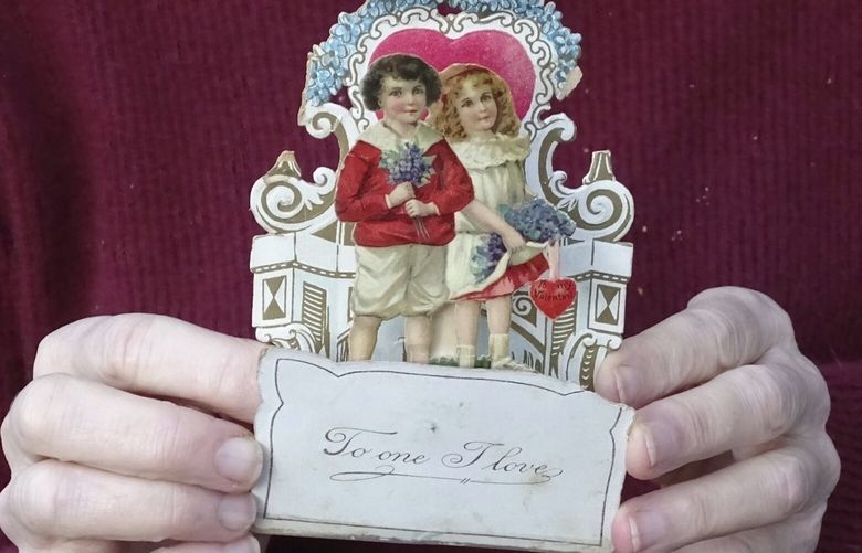 This image shows a Valentine’s Day card from 1917, given to Louise Wirt by Fred Roth when he was in the fourth grade. The couple married years later and the card remained near Louise’s bedside until her death at 91. (Nancy Roth via AP) NYCL300 NYCL300