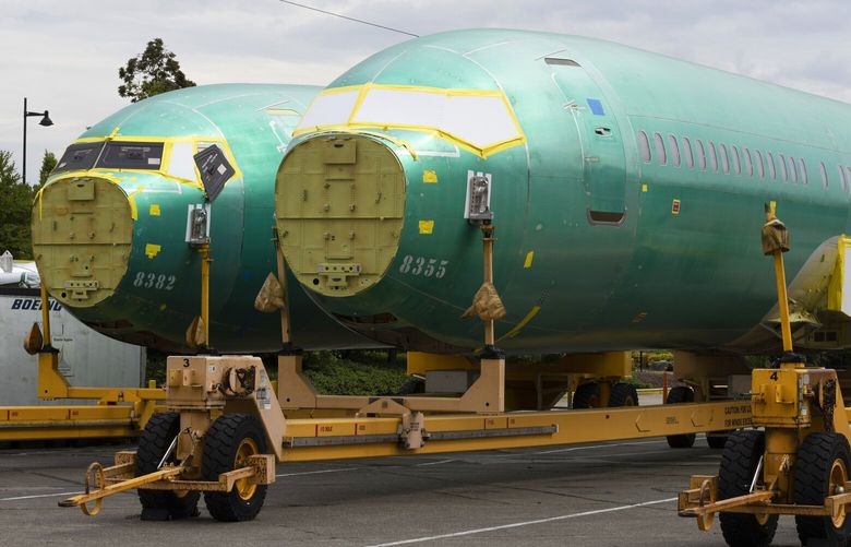 Fuselages for 737 MAX planes sit outside the building where the planes are assembled at Boeingâ€™s Renton plant Wednesday, June 15, 2022. 220682