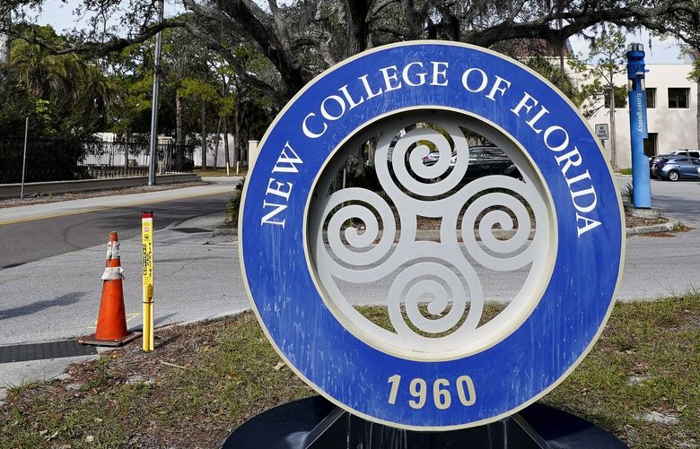 A student makes her way past the sign at New College Friday, Jan. 20, 2023, in Sarasota, Fla. Your education. Your way. Be original. Be you. That’s how New College of Florida describes its approach to higher education in an admission brochure. The state school of fewer than 1,000 students nestled along Sarasota Bay has long been known for its progressive thought and creative course offerings that don’t use traditional grades. The school founded in 1960 is also a haven for marginalized students, especially from the LBGTQ community, said second-year student Sam Sharf in a recent interview. (AP Photo/Chris O’Meara) FLCO104 FLCO104