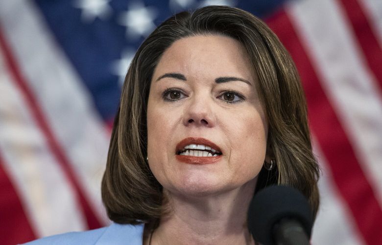 FILE – Rep. Angie Craig, D-Minn., speaks during a news conference on Capitol Hill on June 24, 2020, in Washington. Craig was assaulted in her Washington apartment building on Thursday, Feb. 9, 2023, her chief of staff said, but added that there was no evidence that the attack was politically motivated. (AP Photo/Manuel Balce Ceneta, File) NYAB410 NYAB410