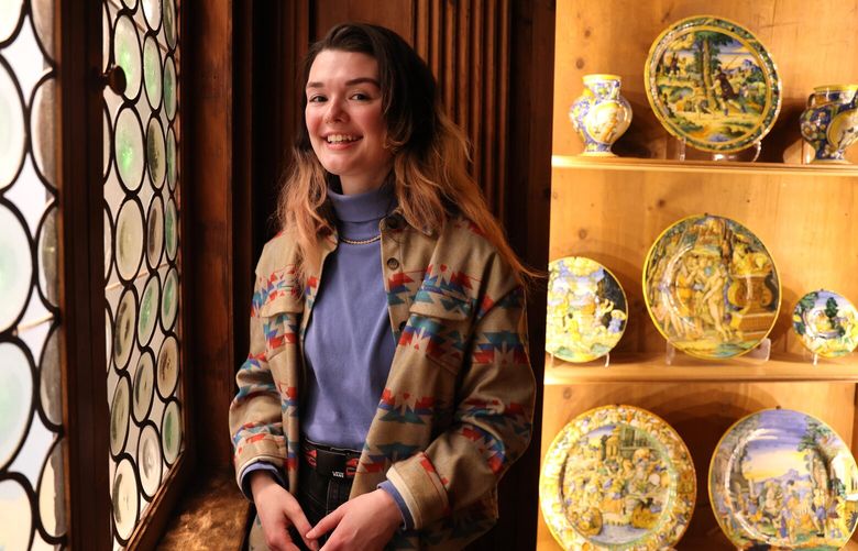 Chelsea Leingang, the Seattle Art Museum’s Visitor Experience Manager, poses for a photo in the “Italian Room” one of their favorite exhibitions at the Seattle Art Museum in Seattle on Wednesday, February 8, 2023.