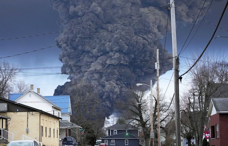 FILE – A black plume rises over East Palestine, Ohio, as a result of a controlled detonation of a portion of the derailed Norfolk Southern trains, Feb. 6, 2023. West Virginia’s water utility says it’s taking precautionary steps following the derailment of a train hauling chemicals that later sent up a toxic plume in Ohio. The utility said in a statement on Sunday, Feb. 16, 2023 that it has enhanced its treatment processes even though there hasn’t been a change in raw water at its Ohio River intake. (AP Photo/Gene J. Puskar, file)