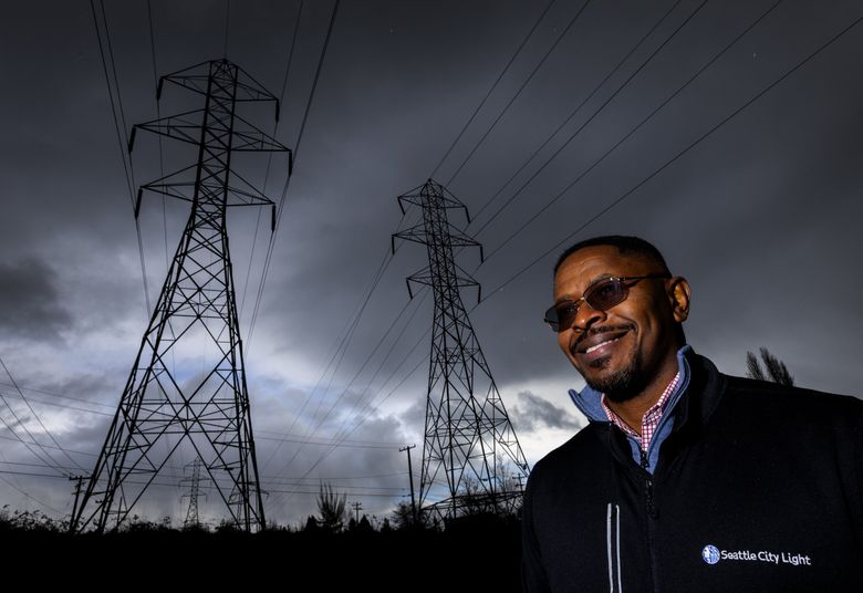 We must decarbonize our grid, says Emeka Anyanwu, the innovation and resources officer for Seattle City Light, but also be careful not to create a tiered system with &#8220;solar on the roof and a Tesla in the garage for some, and a disinvested energy grid for everybody else.&#8221; (Ken Lambert / The Seattle Times)