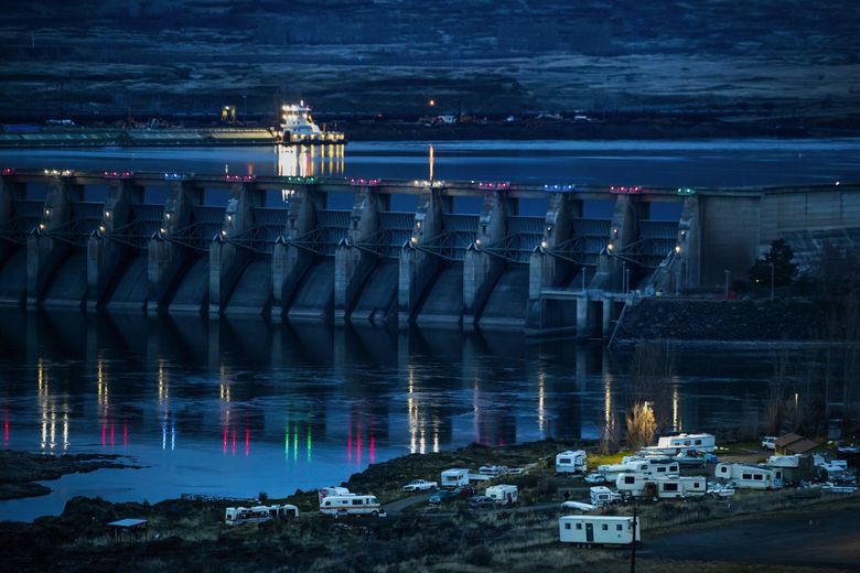 The Lone Pine in-lieu fishing site sits in the shadow of The Dalles Dam. The construction of the dam in the 1950s flooded Celilo Falls, one of the oldest communities in North America. Nearly 50 Native Americans now live at the site. (Andy Bao, 2021)