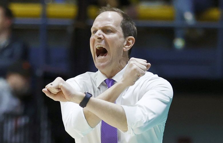 Washington head coach Mike Hopkins gestures to his players against California during the first half of an NCAA college basketball game in Berkeley, Calif., Thursday, Feb. 23, 2023. (AP Photo/Jed Jacobsohn) CAJJ112 CAJJ112