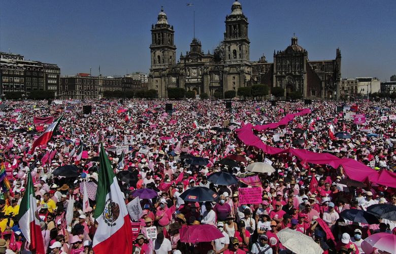Anti-government demonstrators protest against recent reforms pushed by President Andres Manuel Lopez Obrador to the country’s electoral law that they say threaten democracy, in Mexico City’s main square, The Zocalo, Sunday, Feb. 26, 2023. (AP Photo/Fernando Llano) XFLL102 XFLL102