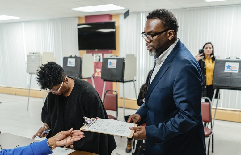 Brandon Johnson, a mayoral candidate, and his wife, Stacie, vote in Chicago, on Tuesday, Feb. 28, 2023. Chicagoans were heading to the polls on Tuesday morning to vote in highly contested mayoral and City Council races that have largely focused on crime, policing and the performance of Mayor Lori Lightfoot, who is seeking a second term leading the nation’s third-largest city. (Jamie Kelter Davis/The New York Times) XNYT109 XNYT109