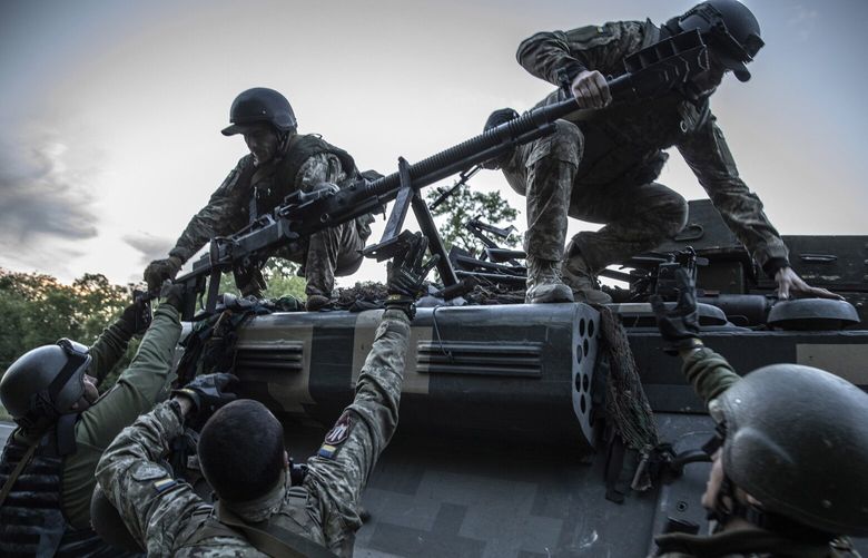 FILE — Ukrainian soldiers from the 95th Air Assault Brigade load a weapon onto an armored vehicle near the city of Kramatorsk, Ukraine, May 25, 2022. Some Republicans and Democrats quizzed military officials about the money that has been sent to Kyiv so far and what is still to come, threatening a consensus in favor of aid. (Finbarr O’Reilly/The New York Times)  XNYT259 XNYT259